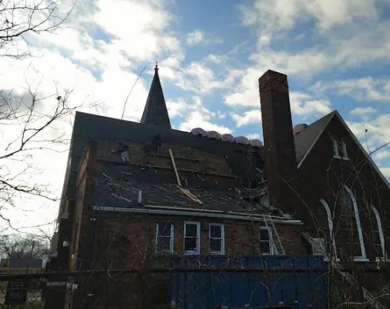The church roof from the street side during the tear-off